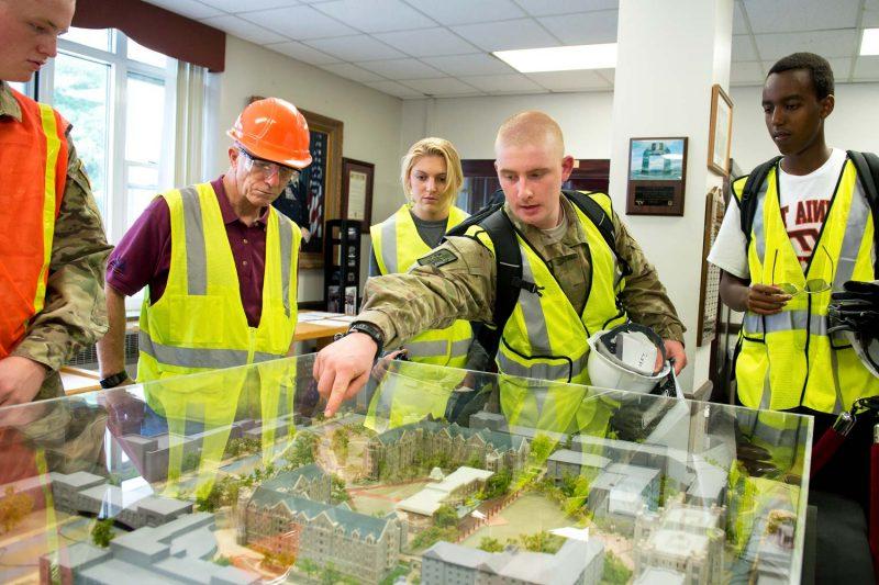 Students work on a construction project